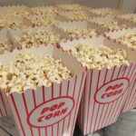 rows of popcorn in cups, ready to sell at a bake sale