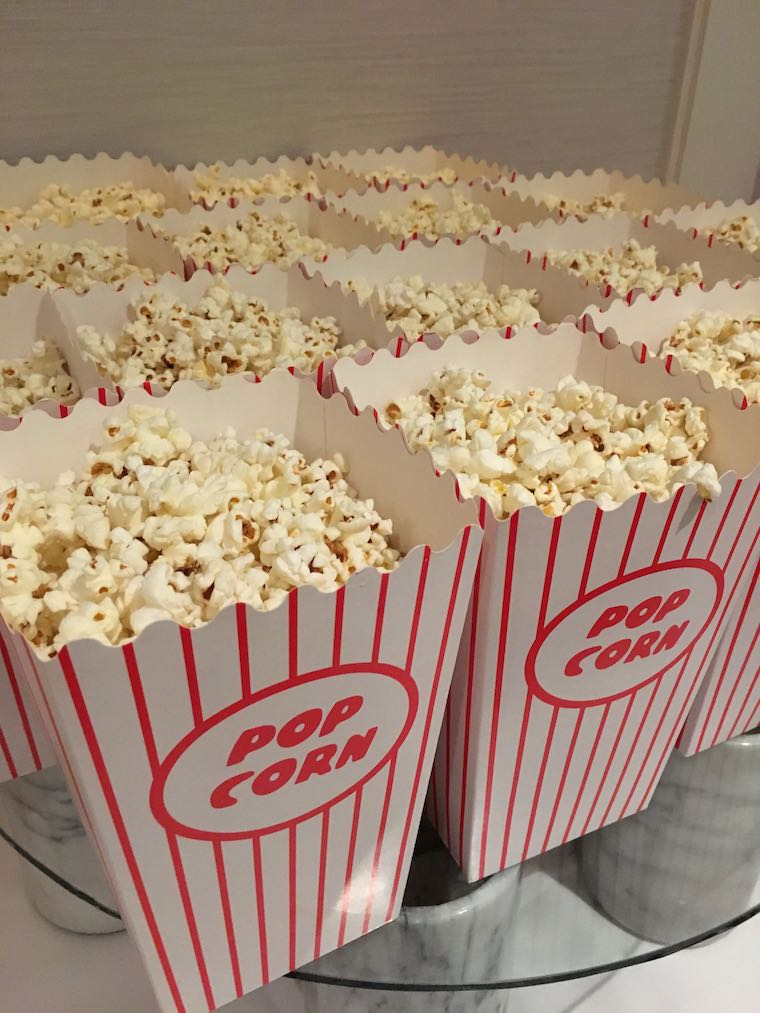 rows of popcorn in cups, ready to sell at a bake sale